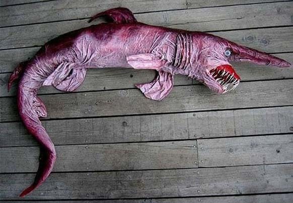 17.) Goblin Shark: These nightmarish sharks live in the ocean at depths greater than 100 m (330 ft). Adults are found deeper than juveniles. These scary sharks pose no threat to humans (but they will haunt your dreams).